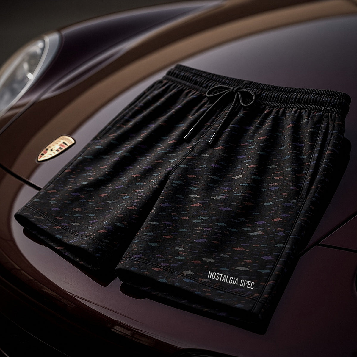 Nostalgia Spec Confetti Throwback Shorts on a maroon Porsche 911 hood